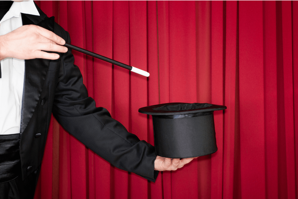 Magician presenting a top hat as a three-word marketing filter